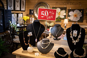 50% off jewelry display - necklaces on small mannequin necks & torsos